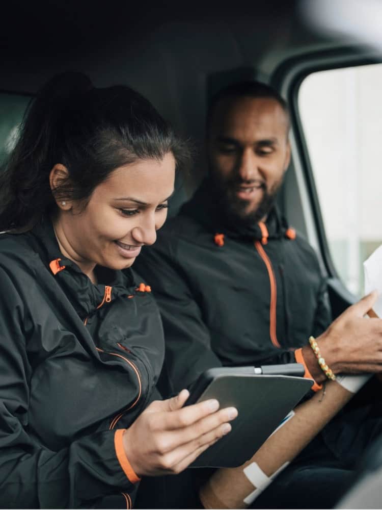 people using tablet in vehicle