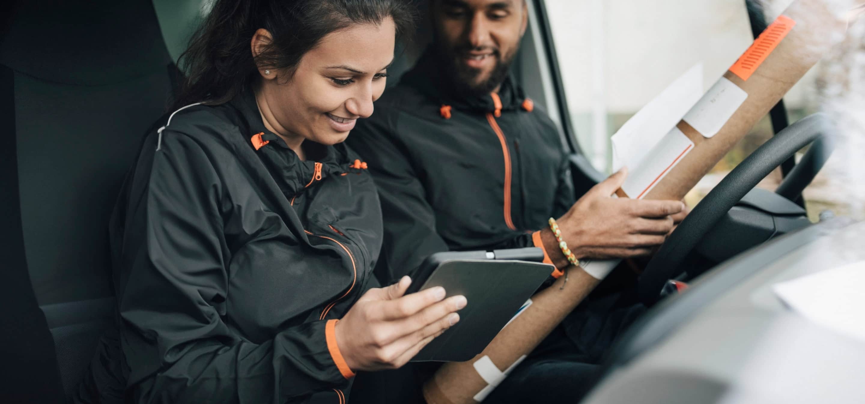 people using tablet in vehicle