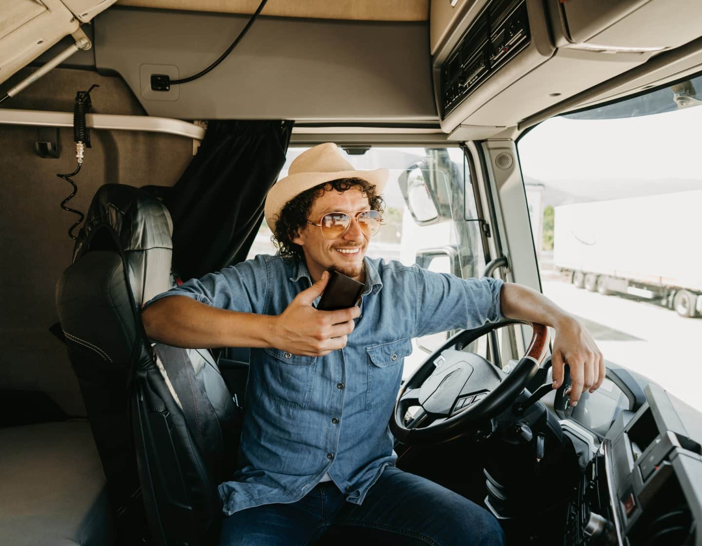 man on phone in truck