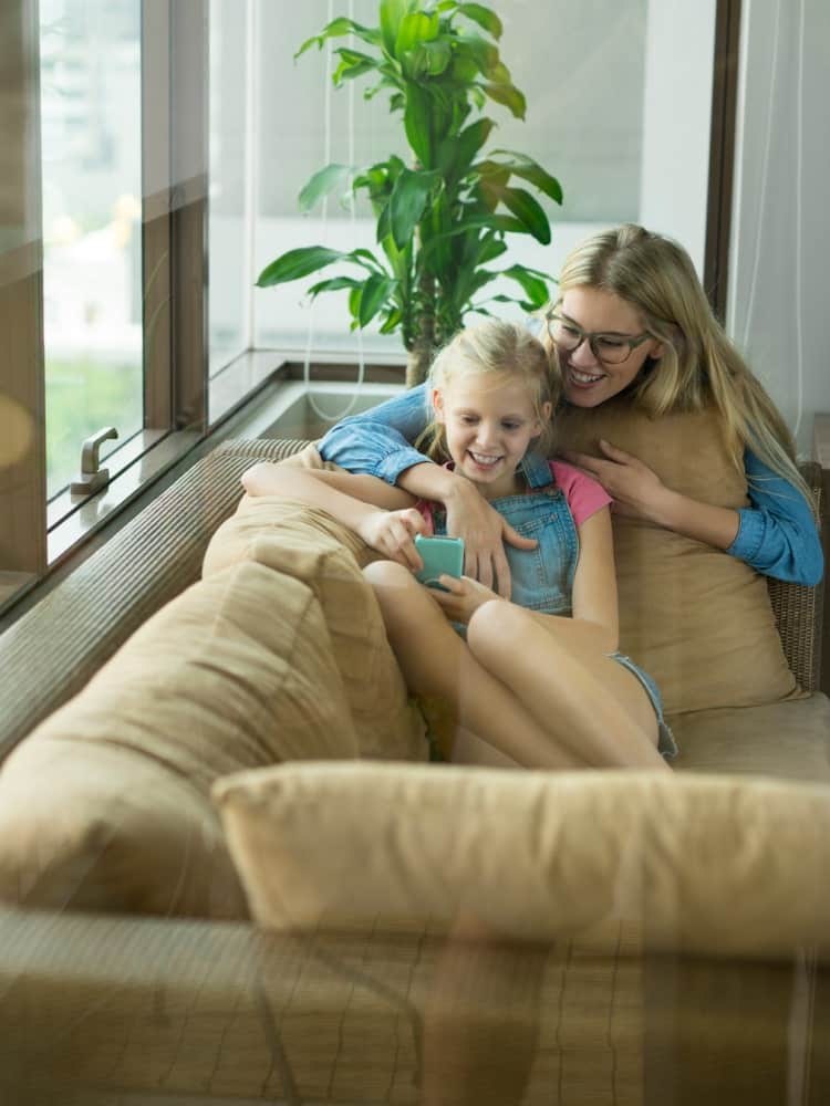 mother and daughter on the couch